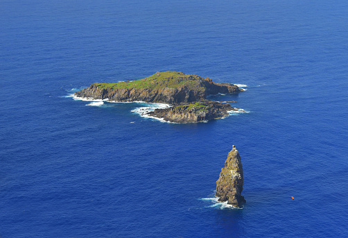 The island of Moto Nui off the coast of the Easter Island where the strongest men had to get a stern egg and bring it back to win the bird man contest, located in the Pacific Ocean, Chile.